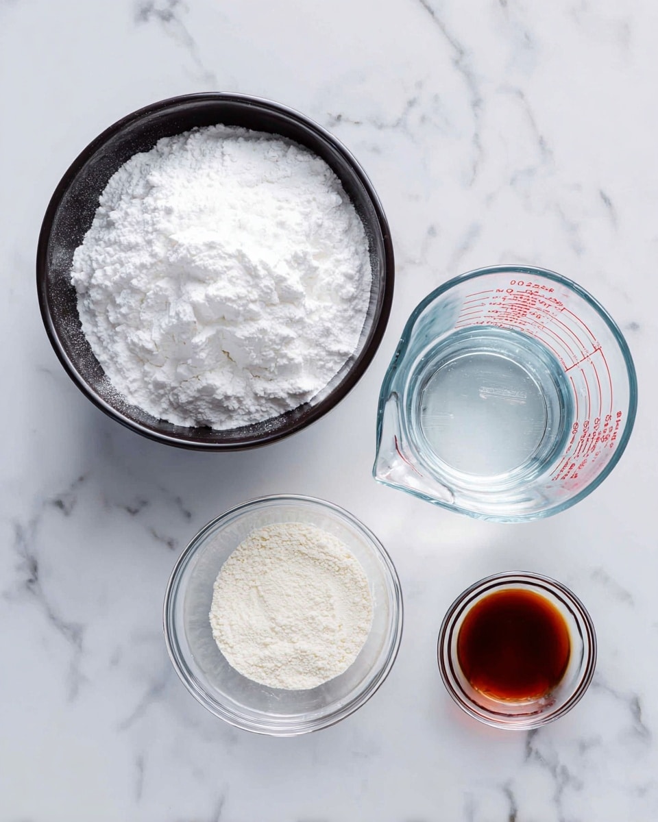 The image shows four containers on a white marbled surface: a large white bowl filled with a fluffy white powdery substance on the left, a clear measuring jug with water near the top right, a small clear bowl with a finer white powder below the jug, and a tiny clear bowl with a golden brown liquid next to the small bowl. All items are neatly arranged with good lighting, showing fine textures of powders and smooth glass surfaces. Photo taken with an iphone --ar 4:5 --v 7