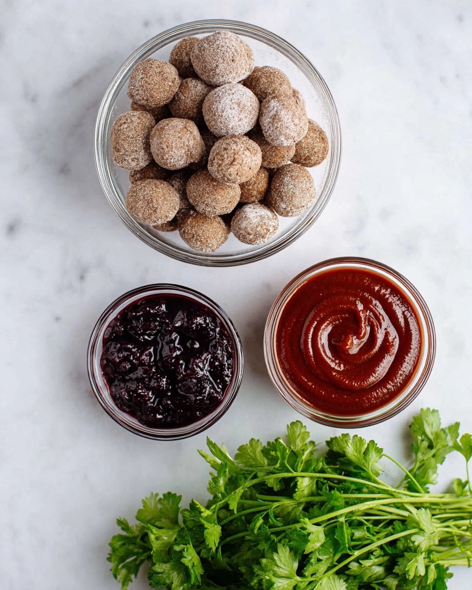 The image shows three clear glass bowls and a bunch of fresh green parsley on a white marbled surface. The largest bowl is filled with round, brown nuts covered lightly in a white powder, placed at the top left. To the right of it, there is a smaller bowl filled with a smooth, thick red sauce with swirled patterns on top. Below, on the left side, another small bowl contains a dark purple, shiny jam with a slightly uneven surface. The bunch of parsley has bright green leaves and is placed at the bottom right part of the image, creating a fresh contrast with the other items. photo taken with an iphone --ar 4:5 --v 7