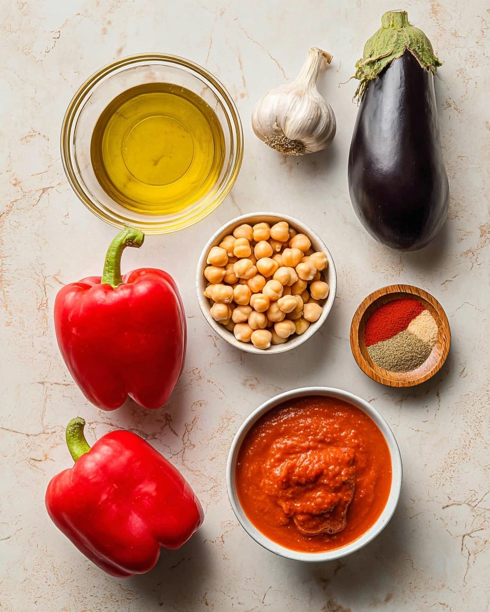 The image shows seven ingredients arranged on a white marbled surface: a single dark purple eggplant with a green stem at the top right, a whole bulb of garlic nearby, a cluster of two bright red bell peppers at the bottom left, a small white bowl filled with chickpeas on the right center, a clear glass bowl with golden olive oil at the top left, a white bowl with smooth red tomato sauce below the olive oil, a tiny white dish with a dollop of red paste near the center, and a small wooden bowl holding a mix of ground spices including a reddish and a light brown powder placed at the bottom right. Photo taken with an iphone --ar 4:5 --v 7