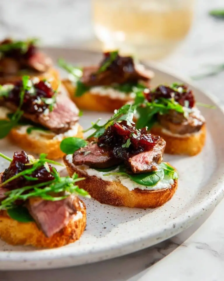 Steak Crostini with Goat Cheese, Sundried Tomatoes, and Arugula Recipe