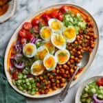 Spiced Chickpeas and Soft-Boiled Eggs with Herb Garlic Yogurt and Tomato Cucumber Salad Recipe