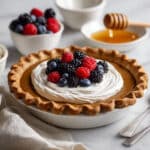 Honey Huckleberry Pie with Fresh Berries and Whiskey-Infused Sauce Recipe