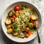One-Pot Lemon Herb Chicken with Roasted Cherry Tomatoes, Zucchini, and Onions Recipe