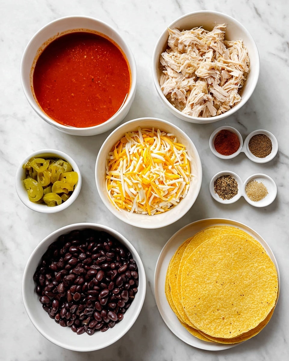 A top view of six white bowls and a white plate arranged over a white marbled surface, each holding different ingredients: the first bowl at top left contains a bright red sauce with a smooth texture, below it a bowl with shredded light beige chicken, to the bottom center a bowl filled with shiny black beans, and in the middle a bowl full of shredded yellow and white cheese. The top center bowl holds chopped light green and yellow pickled peppers, and a small bowl at top right has four neatly separated spices in shades of dark red, beige, light brown, and off-white. On the right side, a white plate holds a neat stack of yellow corn tortillas. photo taken with an iphone --ar 4:5 --v 7