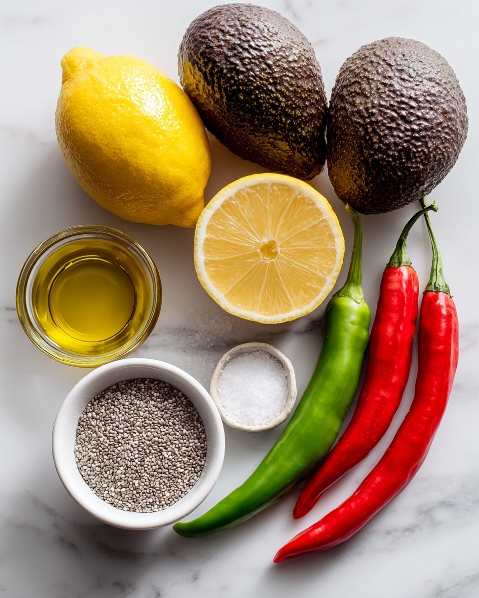 The image shows all the ingredients for a recipe placed on a white marbled surface. There are two brown, bumpy avocados at the top, with a halved yellow lemon beside them showing its juicy inside. Below the lemon is a small white bowl filled with small white chia seeds. To the left of this bowl is a clear glass cup holding golden olive oil. Below the olive oil, there is a small round white bowl containing salt and pepper. On the right side of the image, there are two long chili peppers, one bright red and one deep green, both shiny and smooth. All labels for the ingredients are written in white handwritten text around each item. Photo taken with an iphone --ar 4:5 --v 7
