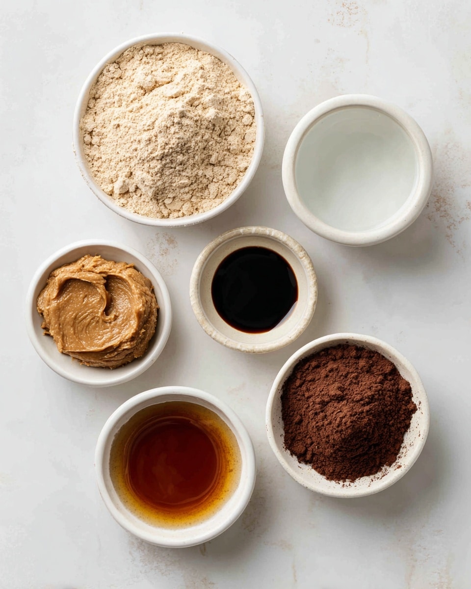 The image shows six white bowls arranged on a white marbled surface, each holding a different ingredient. At the top left is a bowl filled with light beige protein powder. To its right is a bowl with clear water. Below the protein powder is a small white bowl with smooth light brown sunbutter. Centered slightly below the water bowl, there is a bowl filled with dark amber maple syrup. At the bottom right corner is a bowl with dark brown cacao powder, and next to it on the right is a small bowl filled with dark vanilla extract. The setup is clean and simple, with each bowl clearly showing the texture and color of its ingredient, photo taken with an iphone --ar 4:5 --v 7