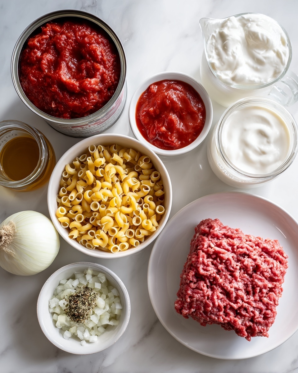 The image shows various cooking ingredients arranged on a white marbled surface. On the left, there is an open large can filled with crushed tomatoes in a deep red color. Next to it is a small white bowl with bright red tomato paste. Below that, there is a small glass jar with light brown stock. In the center, a white bowl holds a pile of small yellow pasta tubes. Beside it, a white bowl contains chopped white onions with a slightly translucent texture. Below the onions, a small white bowl contains minced garlic mixed with dried green and black herbs. On the right side, a white plate holds a rectangular chunk of raw ground beef with a red and slightly shiny texture. Above the beef, there is a clear glass jug filled with thick white heavy cream. The overall look is clean and organized with bright and natural lighting, photo taken with an iphone --ar 4:5 --v 7