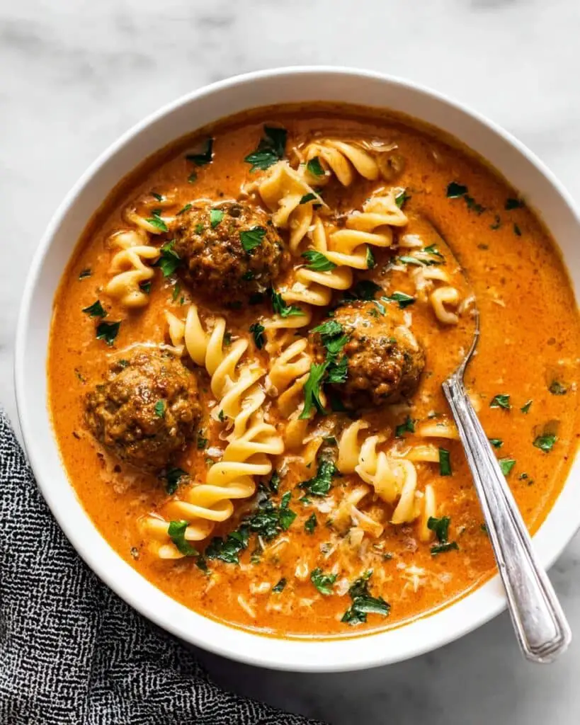 Hearty Meatball Soup with Spinach, Pasta, and Parmesan Recipe
