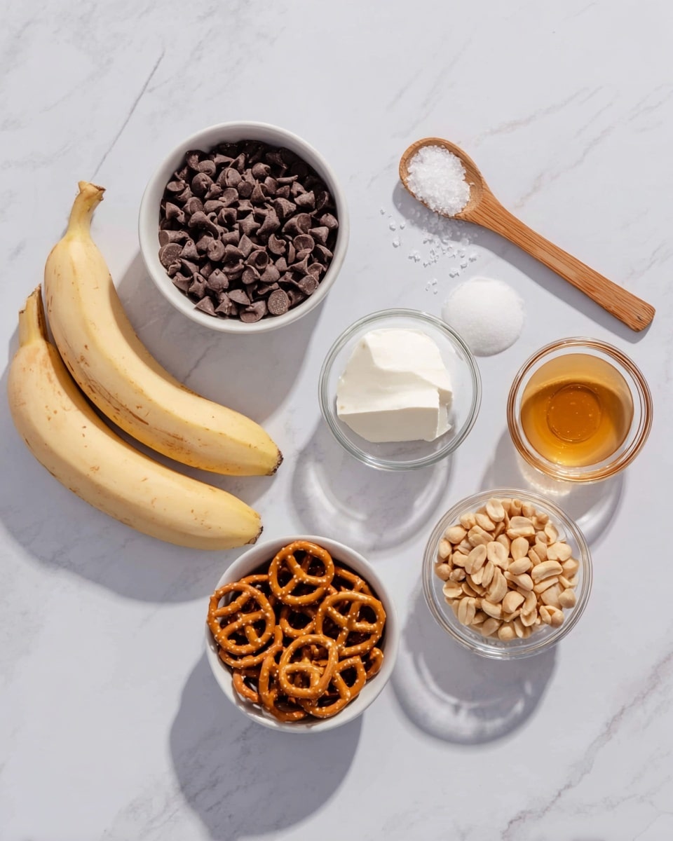 The image shows seven ingredients on a white marbled surface, all spread out neatly. There are two peeled bananas laying side by side on the left. Above them, a white bowl is filled with small, dark brown chocolate chips. To the right of the bowl, a wooden spoon holds coarse salt crystals in the center. Next to the spoon, a small clear glass bowl contains a light, creamy white solid. Further right, a clear glass bowl with a honey-colored liquid sits. Below these bowls, two small white bowls sit side by side, one filled with small pretzels that are shiny and light brown, and the other filled with light tan peanuts. The overall look is clean and simple with soft light casting shadows. photo taken with an iphone --ar 4:5 --v 7