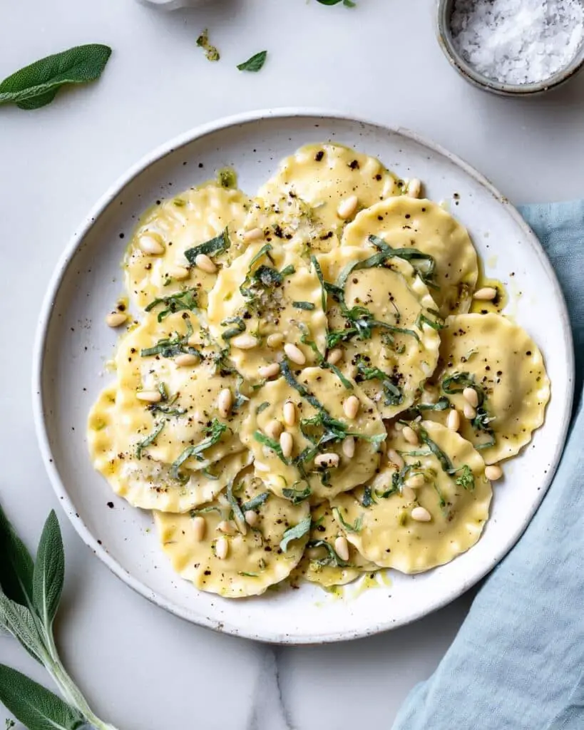 Corzetti with Fresh Herbs, Garlic, and Toasted Pine Nuts Recipe