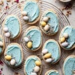 Frosted Egg-Shaped Cookies with Speckled Vanilla Buttercream and Cadbury Mini Eggs Recipe