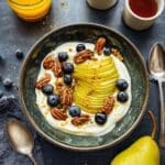 Greek Yogurt Breakfast Bowl with Pear, Blueberries, and Pecans Recipe