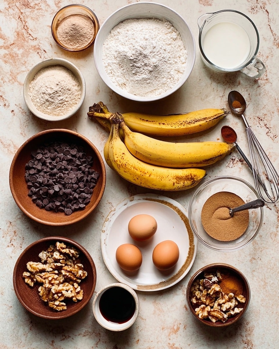 The image shows several baking ingredients arranged neatly on a white marbled surface. At the top left, there is a small round white bowl with a pale powder and next to it a larger white bowl filled with flour. To the right is a glass measuring cup with a white liquid inside. Below the flour bowl, there is a white bowl with two brown eggs inside. Three ripe yellow bananas with brown spots lie diagonally across the center of the image. To the left, there is a brown bowl filled with dark chocolate chips, and near the bottom center is a small white cup with dark liquid, likely vanilla extract. At the bottom right, a medium brown bowl contains a light brown granulated substance, and next to it a clear glass bowl holds mixed walnut pieces. A small white plate holds a few spices including white baking soda, brown cinnamon, and other powders, with metal measuring spoons resting on the side. A small jar of clear amber liquid is visible near the eggs. The setting gives a natural, rustic feel with soft light, and no person's hand is visible. Photo taken with an iphone --ar 4:5 --v 7