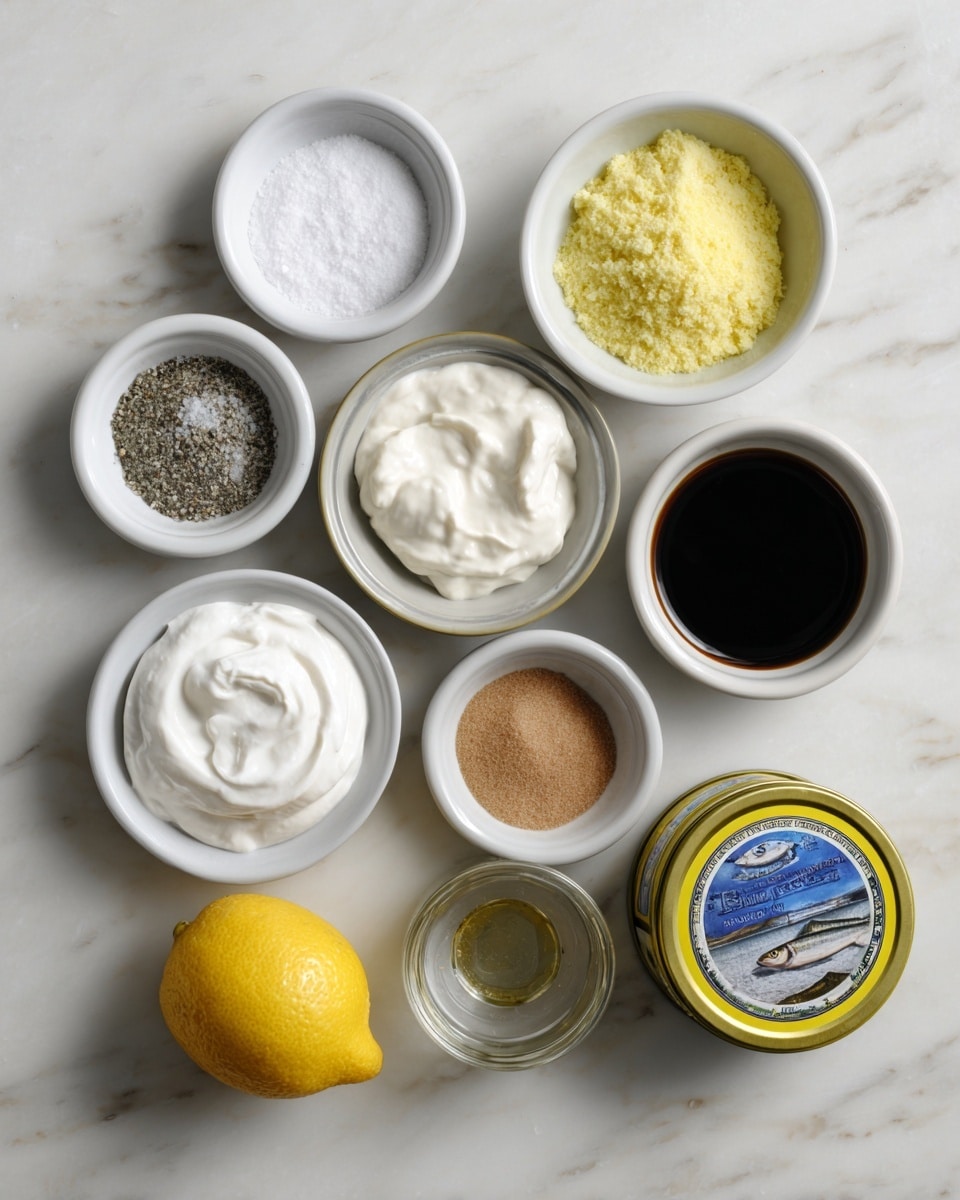 The image shows nine ingredients arranged on a white marbled surface. At the top left is a small white bowl containing coarse salt and black pepper. Next to it, in a small clear glass bowl, are small chopped garlic pieces. To the right is a white bowl filled with grated parmesan cheese. Below the salt and pepper bowl is a small yellow tin of anchovies with a blue border and red text. In the center, there is a white bowl with smooth, creamy Greek yogurt. To the right of the yogurt bowl is a small clear glass bowl filled with water. Below the anchovies tin is a small white bowl containing dark Worcestershire sauce. Slightly below and right of the yogurt bowl is a small white bowl with smooth Dijon mustard. On the bottom right corner sits a whole bright yellow lemon. The photo taken with an iphone --ar 4:5 --v 7
