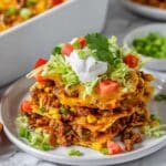 Cheesy Taco Bake with Lettuce, Tomato, and Sour Cream Recipe
