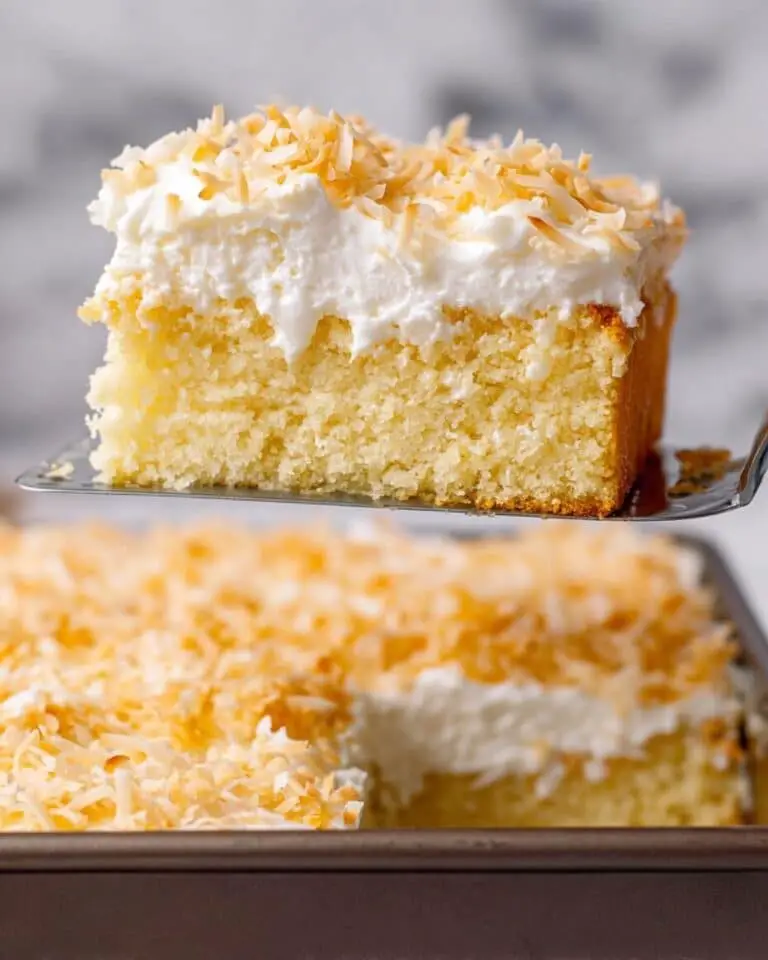 Coconut Poke Cake with Toasted Shredded Coconut Recipe