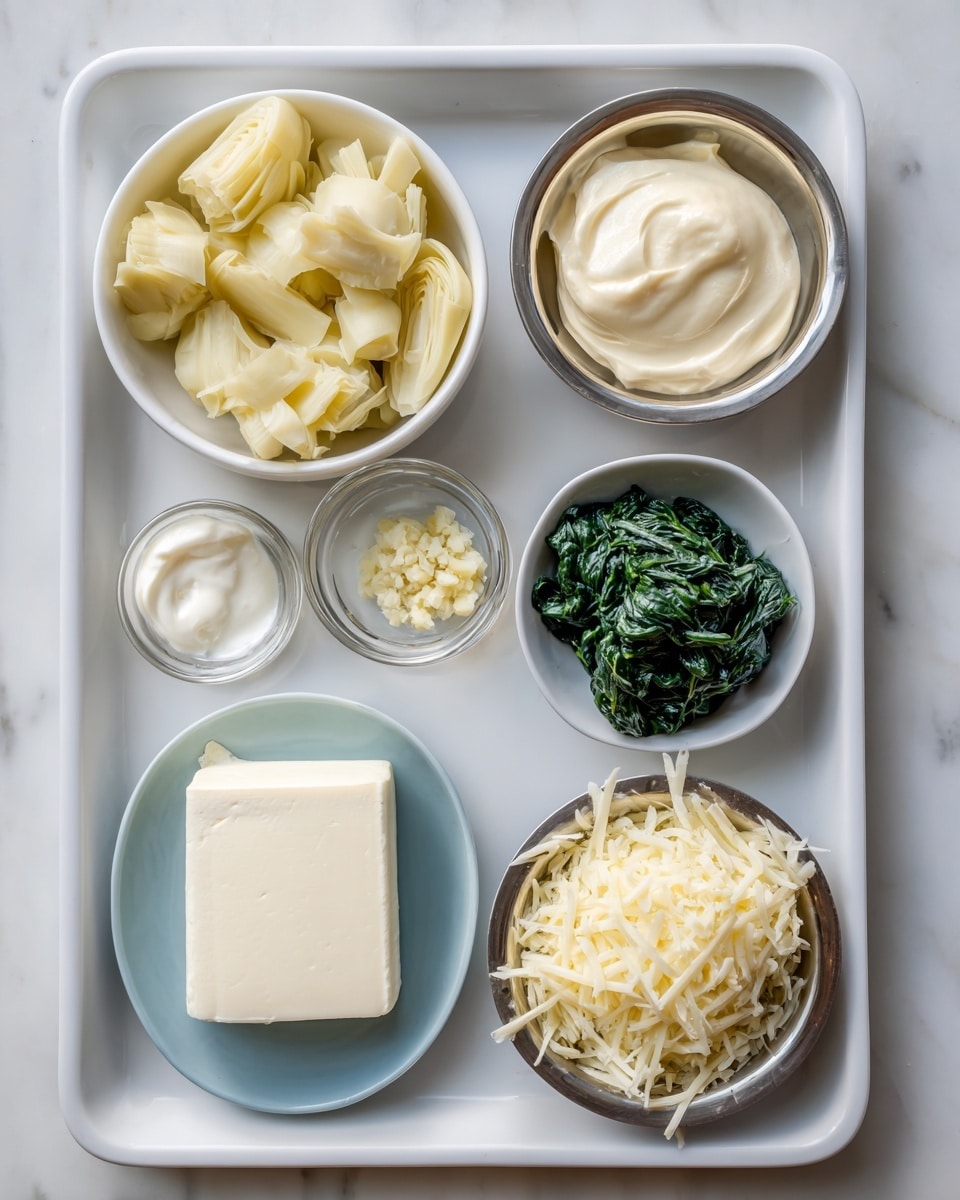 A white tray holds seven small bowls with different ingredients arranged neatly. On the top left, a white bowl filled with chunky pale yellow artichoke hearts is placed. To the right, a small metal bowl contains a dollop of thick mayonnaise with a light cream color. Below it, near the center, a tiny glass bowl has minced garlic, small and pale yellow. On the middle right, a white plate with a blue tint shows a large rectangular piece of smooth cream cheese, pure white in color. In the bottom left corner, a metal bowl is filled with thick sour cream, bright white and smooth. Next to it, a white bowl holds dark green frozen spinach, fluffy and slightly textured. On the bottom right, a small metal bowl is heaped with shredded parmesan cheese, pale yellow with fine strands. All these are set on a white marbled surface. Photo taken with an iphone --ar 4:5 --v 7