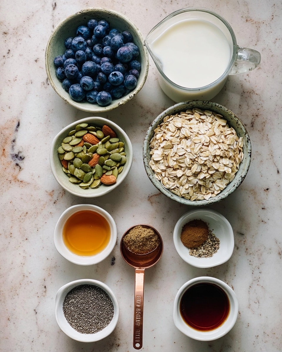 The image shows eight small white bowls and a measuring cup arranged on a white marbled surface. The top left bowl is filled with dark blue blueberries, while the top right measuring cup holds white milk. Below the blueberries is a white bowl with green pumpkin seeds and light brown almond slices. Next to it, a copper measuring cup contains light tan rolled oats. Under these, a white bowl is filled with tiny gray chia seeds. There are three smaller white bowls at the bottom row: the middle bowl has amber-colored honey, the right bowl contains dark brown vanilla extract, and the left bowl holds brown and gray ground spices. The ingredients are neatly arranged for cooking or baking. photo taken with an iphone --ar 4:5 --v 7