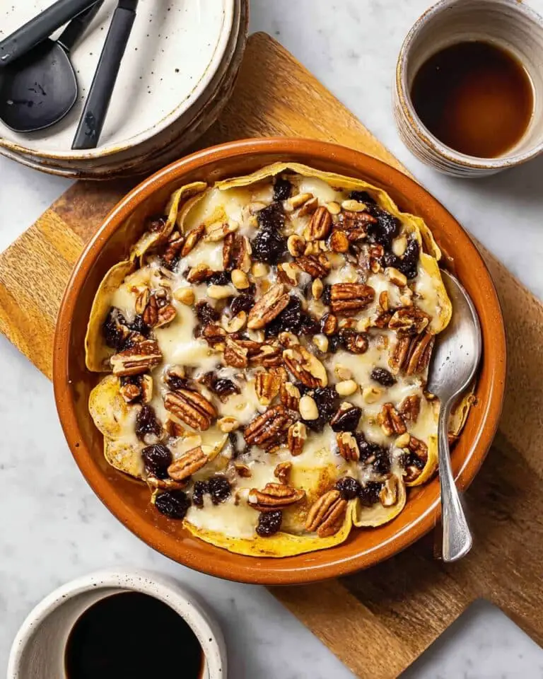 Classic Mexican Capirotada Bread Pudding with Molasses, Nuts, and Queso Fresco Recipe