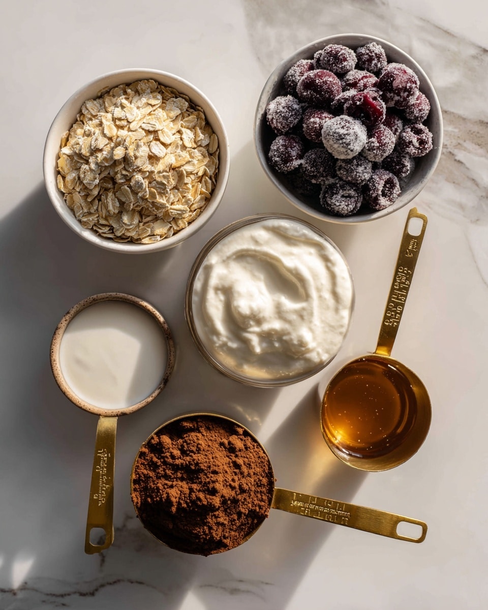 The image shows six white bowls and measuring cups arranged on a white marbled surface. At the top left is a bowl filled with light golden oats, with a rough, flaky texture. To its right, a bowl contains dark purple frozen cherries, covered with a light frost. Below, there is a brass-handled measuring cup filled with thick, creamy white yogurt, and next to it, another measuring cup holds smooth, white milk. Beneath them, a measuring cup contains rich, dark brown cocoa powder with a dry, fine texture. At the bottom, a measuring cup is filled with amber-colored liquid sweetener, smooth and shiny. Each cup has a wooden handle with measurement markings. The arrangement is neat and clean, with natural lighting highlighting the textures and colors, photo taken with an iphone --ar 4:5 --v 7