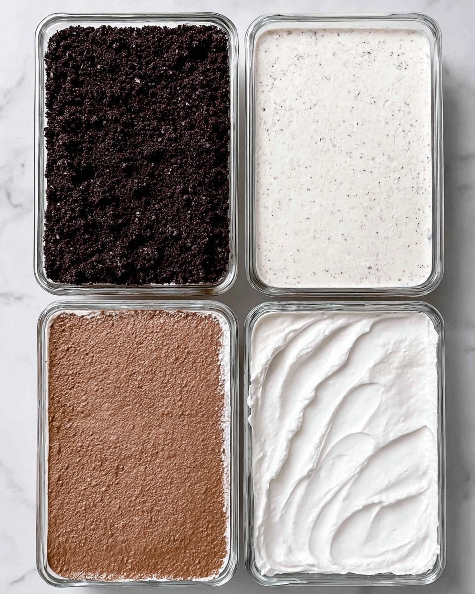 The image shows four rectangular glass containers arranged in a 2x2 grid on a white marbled surface. The top-left container has a dark, crumbly layer that looks like crushed cookies or chocolate crumbs, spread evenly. The top-right container has a creamy white layer with tiny dark specks mixed in, smooth in texture. The bottom-left container contains a dense, light brown layer, somewhat textured but spread evenly. The bottom-right container has a smooth, bright white layer with subtle swirls on the surface, giving it a soft and fluffy look. Photo taken with an iphone --ar 4:5 --v 7
