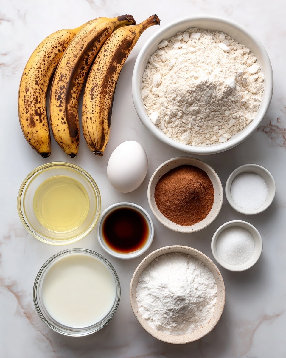 The image shows a top view of ingredients laid out neatly on a white marbled surface. Starting from the top left, there are three overripe bananas with yellow skin and brown spots. To the right, a white bowl filled with white flour sits nearby. Below the bananas, there is a small metal bowl of white granulated sugar, next to a whole white egg placed alone. Below the egg is a small white bowl holding dark brown vanilla extract. To the right of the vanilla, there is a small white bowl with some white salt. Below the salt, another white bowl contains white baking powder. Below the sugar, a small speckled white bowl holds brown cinnamon powder. In the center, a transparent glass bowl contains white milk, and to the right of it, a clear round glass bowl has light yellow oil. At the bottom left, a white bowl is full of white powdered sugar. Each item is clearly labeled with black text on white backgrounds. photo taken with an iphone --ar 4:5 --v 7