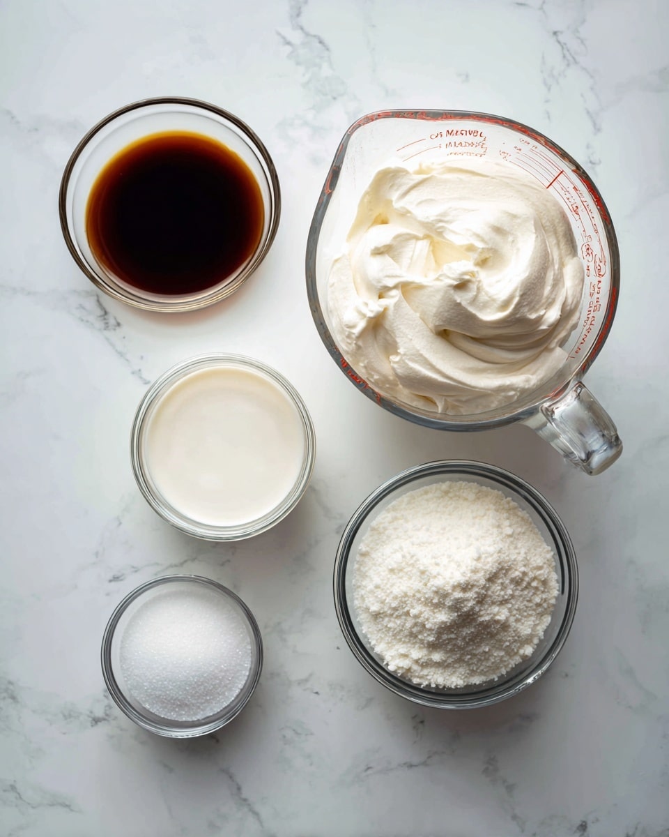 The image shows five clear glass containers arranged on a white marbled surface, each filled with a different ingredient. At the top right, there is a large measuring cup holding thick white cream. Below it and slightly to the left, a similar-sized measuring cup contains a lighter white liquid labeled half & half. To the right of the half & half, a smaller glass bowl holds fine white sugar. Above the sugar, a very small bowl contains a white powdery salt. On the top left, a small round glass bowl is filled with a dark brown vanilla extract. Each container is labeled with bold black text on white strips placed over the ingredients. photo taken with an iphone --ar 4:5 --v 7