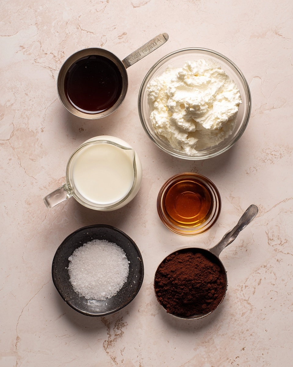 The image shows six different ingredients on a light pink surface with a white marbled texture. There is a clear glass bowl filled with white, fluffy Greek yogurt placed in the upper right corner. Near the top left is a small metal measuring cup filled with dark brown maple syrup. Below it is a small glass pitcher holding off-white almond milk. To the right of the almond milk pitcher, there is a tiny clear glass bowl containing dark amber vanilla extract. In the bottom right corner, a metal measuring cup contains a mound of dark brown cacao powder. Finally, at the bottom left, a small round black bowl with a rough texture holds coarse white sea salt. Each item is neatly arranged and spaced from one another. Photo taken with an iphone --ar 4:5 --v 7