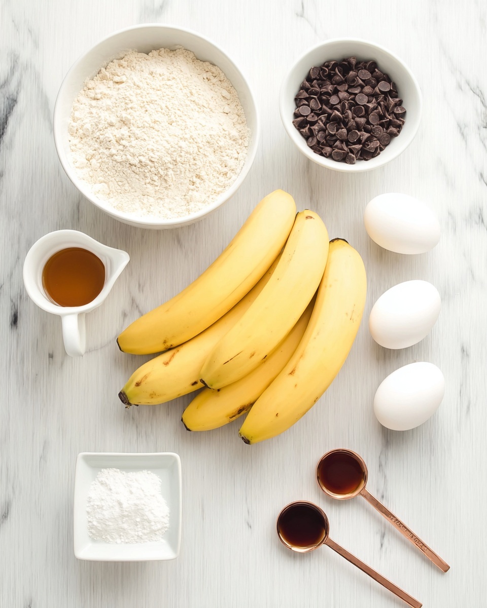 The image shows a white marbled surface with seven yellow bananas placed in the center, slightly leaning to the right. On the top left, there is a large white bowl filled with light beige flour, and to the top right, a smaller white bowl holds dark brown chocolate chips. Below the flour bowl, three white eggs are arranged in a vertical line. At the bottom left, there is a small white pitcher filled with golden brown maple syrup. In the middle bottom, a small square white dish contains white baking powder. To the bottom right, two white measuring spoons with copper heads hold dark brown vanilla extract and light amber liquid, positioned side by side. Photo taken with an iphone --ar 4:5 --v 7