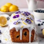 Lemon and Blueberry Loaf Cake with Lemon Drizzle and Edible Flower Decoration Recipe