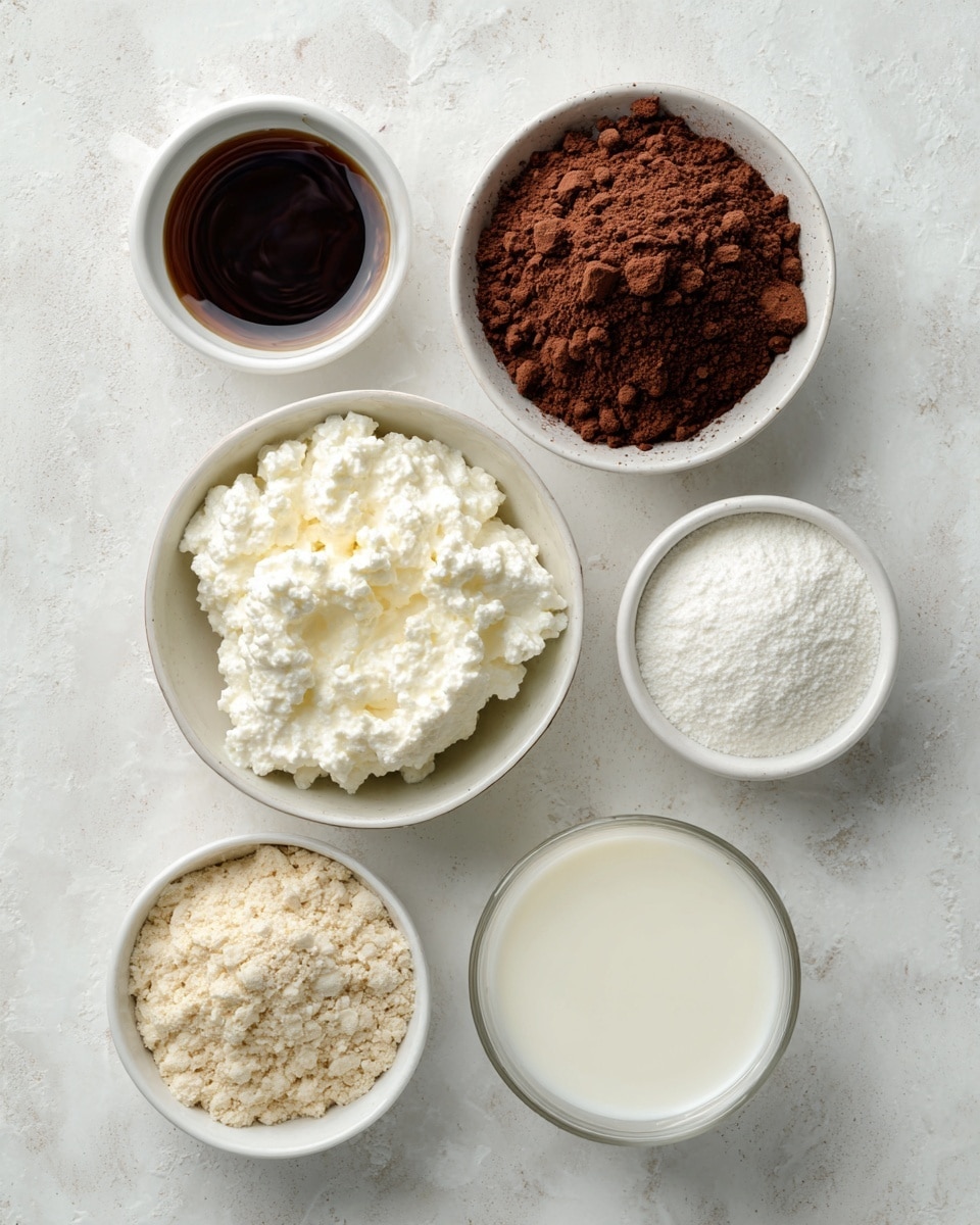 The image shows six small white bowls on a white marbled surface, each containing a different ingredient. In the center is a bowl with creamy white cottage cheese that has a slightly lumpy texture. Above it to the right is a bowl filled with dark brown cocoa powder with a dry, powdery look. To the left of the cocoa is a bowl with a dark liquid labeled vanilla extract. Below the vanilla is a bowl of light beige protein powder with a crumbly texture. To the right of the protein powder is a bowl filled with a fine white sweetener powder. Below the sweetener is a bowl holding smooth white milk. Each ingredient is neatly placed and spaced apart. Photo taken with an iphone --ar 4:5 --v 7