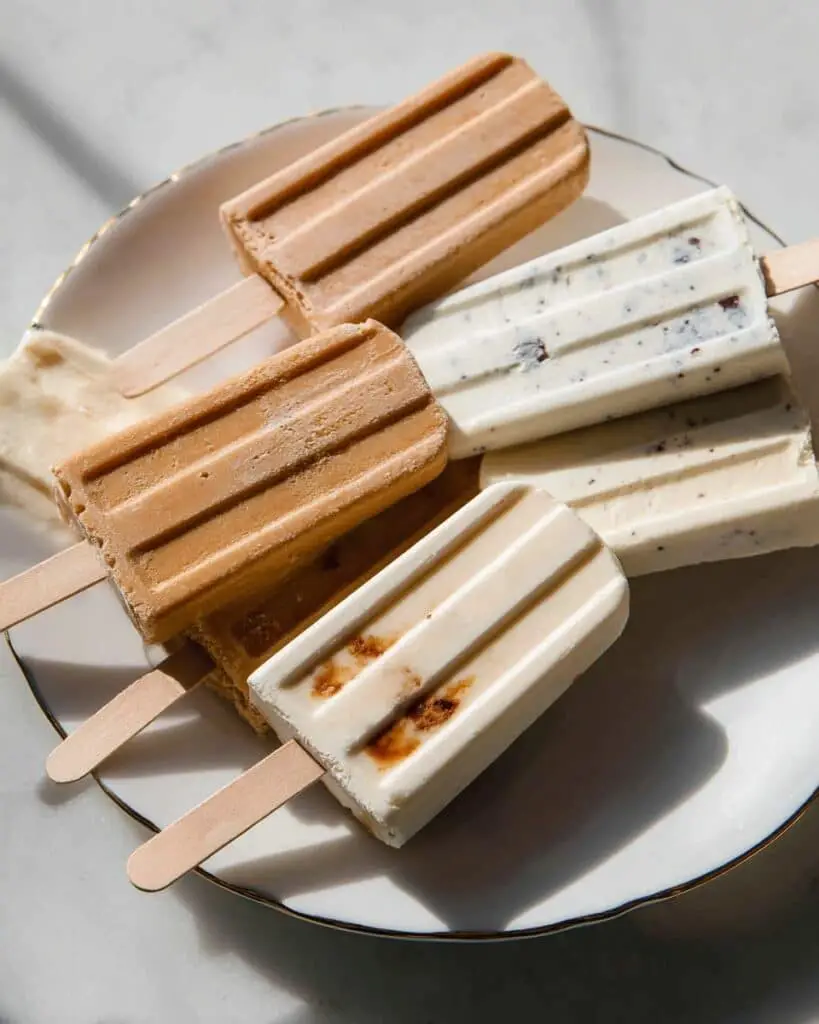 Frozen Yogurt Popsicles with Chocolate, Vanilla, and Blueberry Flavor Options Recipe