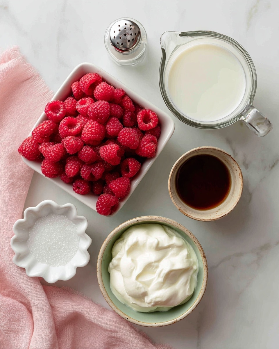 The image shows a top view of six ingredients arranged on a white marbled surface with a light pink cloth on the left side. In the center, there is a white square bowl filled with fresh bright red raspberries. Above it, slightly to the right, is a clear glass measuring cup filled with white milk. To the right of the milk is a small brown ceramic cup with dark brown vanilla extract inside. Below the vanilla cup, there is a round bowl with light beige on the outside and greenish tones on the inside, holding thick white Greek yogurt with a soft texture. Below the raspberries and to the left of the yogurt bowl is a small white scalloped dish with white granulated sugar. At the top left corner, there is a clear glass salt shaker with a silver lid. The ingredients are spaced apart naturally on the white marbled surface. The photo was taken with an iphone --ar 4:5 --v 7
