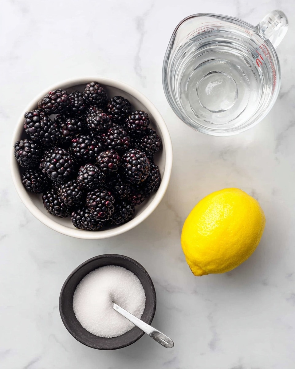 The image shows four elements arranged on a white marbled surface: in the top right is a white bowl full of shiny, dark blackberries with slightly red hints, tightly packed and looking fresh; to the top left is a dark gray bowl filled with fine white sugar and a metal scoop resting inside it; below the sugar bowl, slightly left, is a whole yellow lemon with a smooth skin; and below the lemon, near the bottom center, is a clear glass measuring cup filled with water. The items are spaced evenly and the lighting highlights their colors and textures clearly. photo taken with an iphone --ar 4:5 --v 7