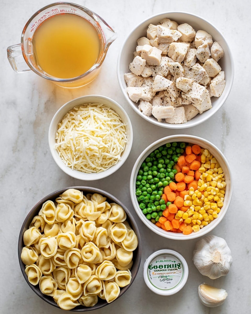 A top view of six containers on a white marbled surface showing cooking ingredients: a glass measuring cup filled with golden broth at the top left, a white bowl with cubed cooked chicken seasoned with black pepper at the top right, a small white dish with salt below the broth, a white bowl filled with shredded white cheese in the middle, a white bowl with mixed frozen vegetables containing orange carrots, yellow corn, green peas, and green beans to the right of the cheese, a dark bowl at the bottom left packed with light yellow tortellini pasta, and a small white dish at the bottom right holding two garlic cloves with their skins on. Photo taken with an iphone --ar 4:5 --v 7