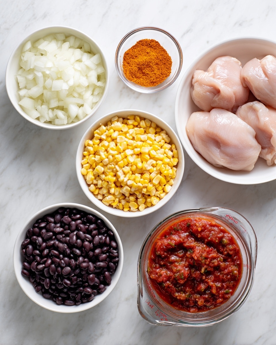 The image shows five bowls and a glass measuring cup arranged on a white marbled surface. Starting from the top left, a white bowl holds chopped white onions with a rough texture, next to it on the right is a small glass bowl filled with bright orange taco seasoning powder. Below the onions, another white bowl is filled with yellow corn kernels, smooth and shiny. To the right, a white bowl contains four pieces of raw chicken with a pale pink color and smooth texture. At the bottom left, a white bowl has black beans, dark and slightly shiny with varied round shapes. Finally, at the bottom right, a clear glass measuring cup is filled with chunky red salsa, showing bits of tomatoes and spices. photo taken with an iphone --ar 4:5 --v 7