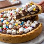 Loaded Chocolate Chip Cookie Pizza with M&M's, Marshmallows, and White Chocolate Drizzle Recipe