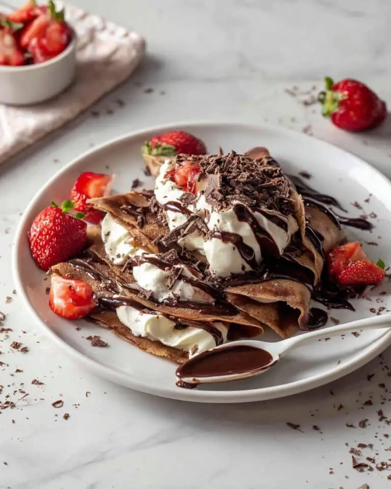 Chocolate Crêpes with Whipped Cream, Strawberries, and Melted Dark Chocolate Recipe
