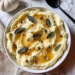 Brown Butter Roasted Garlic Mashed Potatoes with Crispy Sage and Thyme Recipe