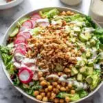 Avocado Caesar Salad with Crispy Pita Breadcrumbs and Lemon Tahini Dressing Recipe