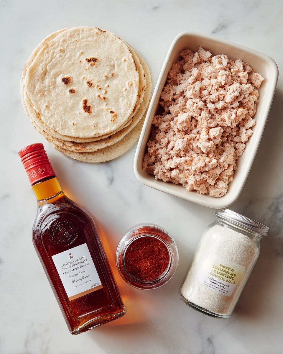 The image shows five items arranged on a white marbled surface: a clear package with several round, light beige tortillas stacked inside, a white tray of light pink ground chicken wrapped in plastic with a red and yellow label, a glass bottle of dark amber hot honey with a red cap and label, a small clear spice jar of deep red paprika with a red and black lid, and a square shaker bottle of white organic garlic powder with a green and yellow label. Each item is neatly placed and clearly visible, with white labels naming each ingredient above or near them. photo taken with an iphone --ar 4:5 --v 7