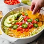 Creamy Taco Dip with Cheddar, Avocado, and Fresh Toppings Recipe