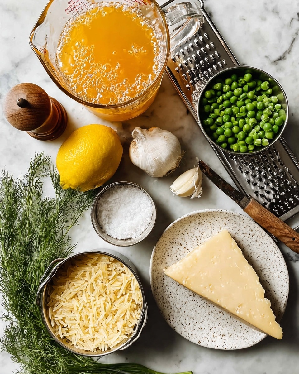The image shows a group of fresh cooking ingredients arranged neatly on a white marbled surface. At the top, there is a clear glass measuring cup filled with bright orange liquid, possibly broth or sauce, with bubbles on its surface. Below it, a yellow lemon sits on a metal grater with a wooden handle. To the right, another glass measuring cup holds fresh green peas with some ice crystals on them. On the left side, a round white bowl contains coarse salt beside a wooden pepper grinder and two cloves of garlic near a bulb. In the center, a metal cup is filled with uncooked pale yellow orzo pasta. At the bottom left, a bunch of green dill rests on the surface. To the right, inside a shallow speckled white bowl, a large wedge of light yellow cheese sits on a metal grater with some grated cheese scattered around it. Photo taken with an iphone --ar 4:5 --v 7