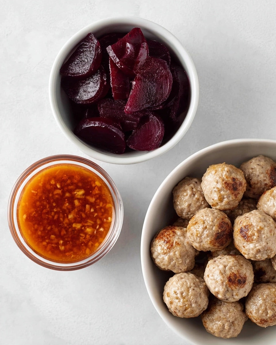 Three white bowls are placed on a white marbled surface. The top right bowl is filled with round, beige meatballs that have a rough texture and some brown spots. The bottom left bowl contains dark purple, sliced beets with a glossy, wet look. The top left bowl holds a reddish-orange sauce with small bits mixed inside, appearing smooth and slightly thick. photo taken with an iphone --ar 4:5 --v 7