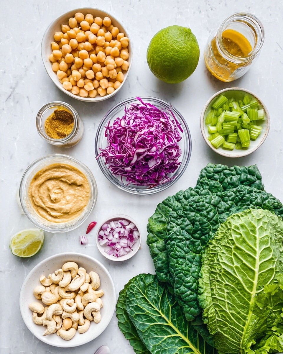 The image shows a top view of various fresh and raw ingredients arranged neatly on a white marbled surface. On the right side, there are large, dark green leafy vegetables in a pile showing textured veins. Next to the leaves is a medium-sized white bowl filled with pale yellow chickpeas. Above it, a whole bright green lime is placed. To the right of the lime is a small white bowl of chopped green celery, and beside it is a clear glass jar filled with a golden-yellow powder spice that has a black lid. Above that, a small clear bowl contains finely diced red onion with a mix of purple and white colors. In the center is a glass jar filled with light brown cashew nuts. Below this jar, slightly to the left, is a small clear bowl with beige hummus spread, and next to it on the left is a white plate holding bunches of fresh green cilantro leaves. To the bottom left, a white bowl contains shredded purple cabbage. At the top left, a small white dish holds golden honey, and a single pinkish garlic clove rests near the center of the setup. Everything is clear, bright, and fresh-looking with colors nicely balanced and textures visible photo taken with an iphone --ar 4:5 --v 7