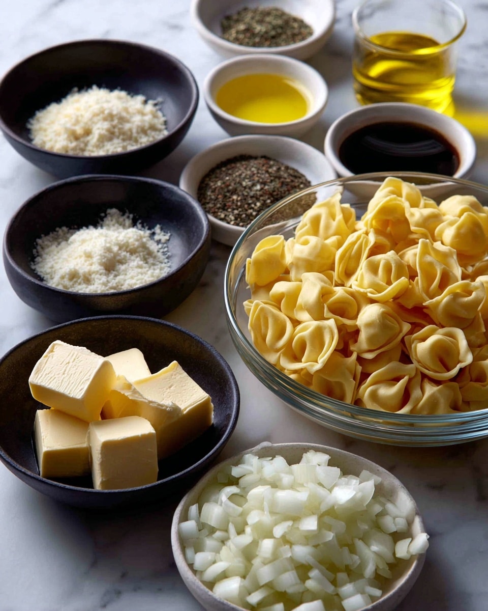 The image shows several small bowls placed on a white marbled surface, each containing different ingredients. There is a large clear glass bowl filled with pale yellow tortellini pasta on the right side. Around it are small white bowls holding light yellow lemon juice, golden olive oil, coarse white salt, and a mix of black and white pepper. A dark bowl contains creamy yellow cubes of butter, another dark bowl holds minced garlic, and a white bowl is filled with diced white onion pieces. The bowls are arranged neatly, showing a variety of textures and soft, earthy colors. Photo taken with an iphone --ar 4:5 --v 7