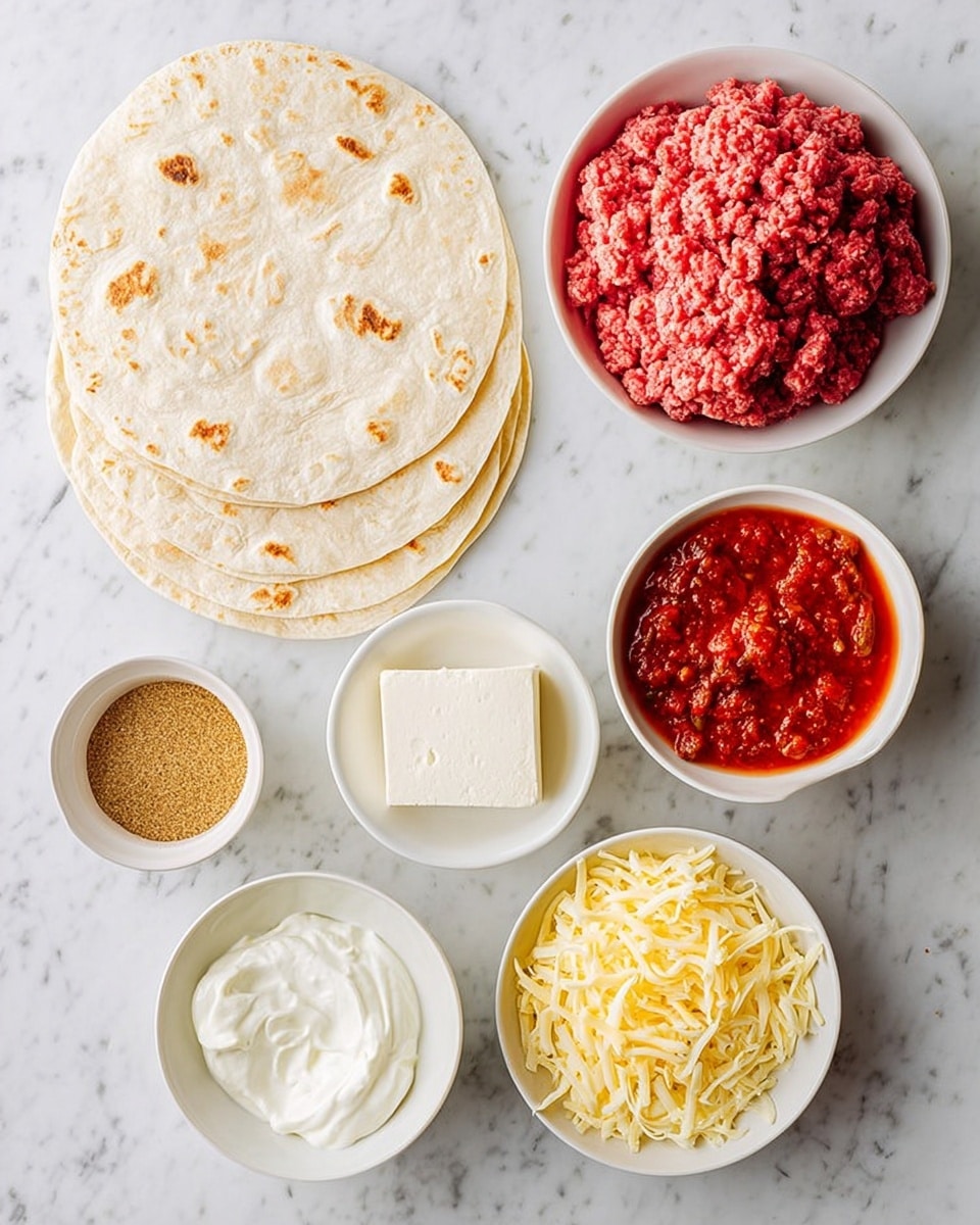 The image shows several white bowls and a stack of six round tortillas arranged on a white marbled surface. The top left has a stack of pale beige tortillas with light brown spots. To the right, a bowl filled with bright red raw ground meat has a soft, coarse texture. Below that, a small bowl contains a powder of golden brown color. Next to it, a bowl of chunky red salsa with a slightly glossy texture is visible. Below the salsa, there is a bowl of shredded pale yellow cheese. To the left of the cheese, a bowl holds a soft white block of cream cheese. At the bottom left, another bowl contains soft, white sour cream with a smooth texture. The photo is taken with an iphone --ar 4:5 --v 7