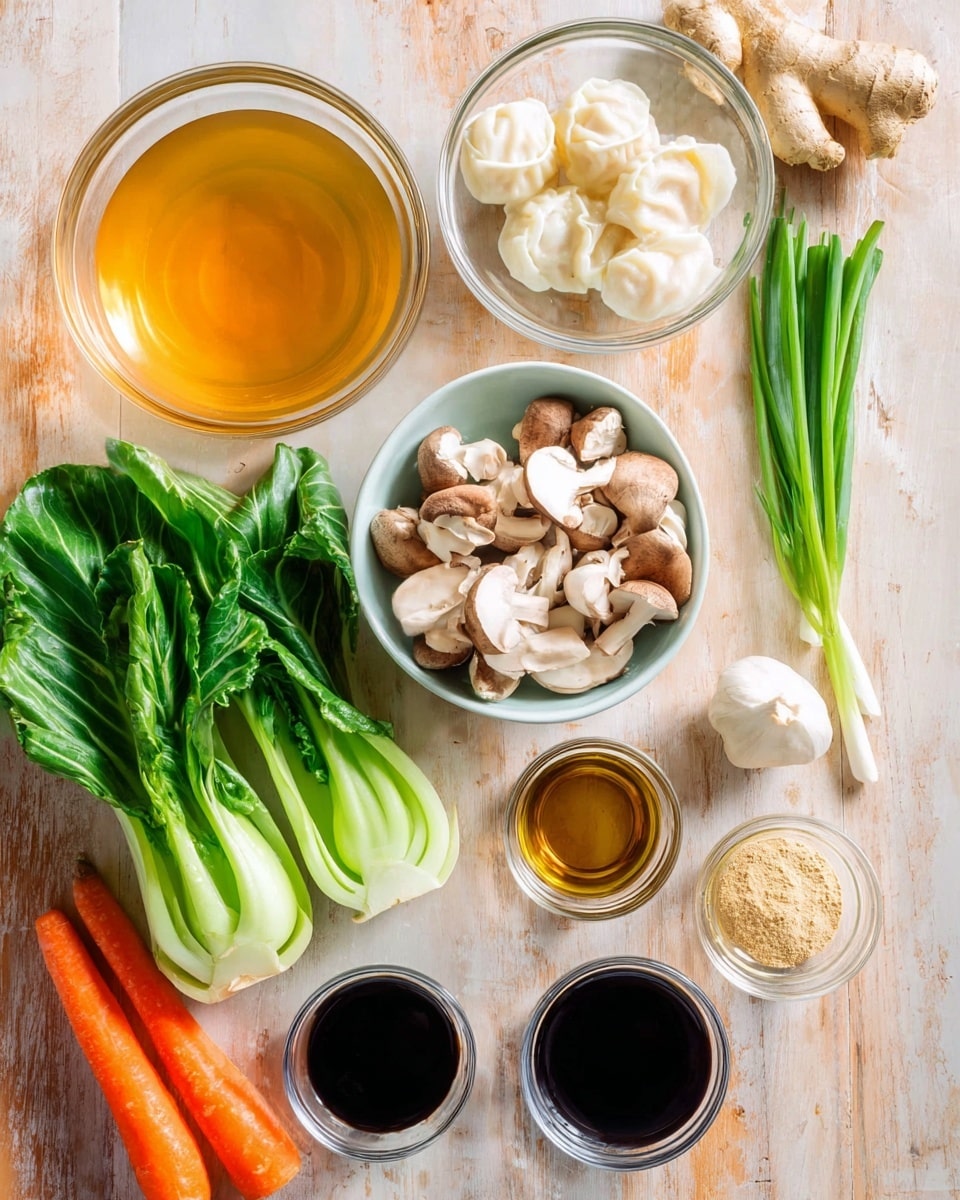 The image shows fresh ingredients arranged on a white marbled surface, including a large clear bowl with golden broth at the top left, a clear bowl with white dumplings at the top right, and a white bowl filled with light brown mushrooms in the center. Around the bowls are bright green bok choy leaves on the left, an orange carrot below the mushrooms, a whole white garlic bulb on the right, and bright green scallions on the far right. Small clear glass bowls contain dark brown soy sauce, light golden oil, and light brown powder, positioned near the garlic and scallions. A piece of ginger root sits near the top center. photo taken with an iphone --ar 4:5 --v 7