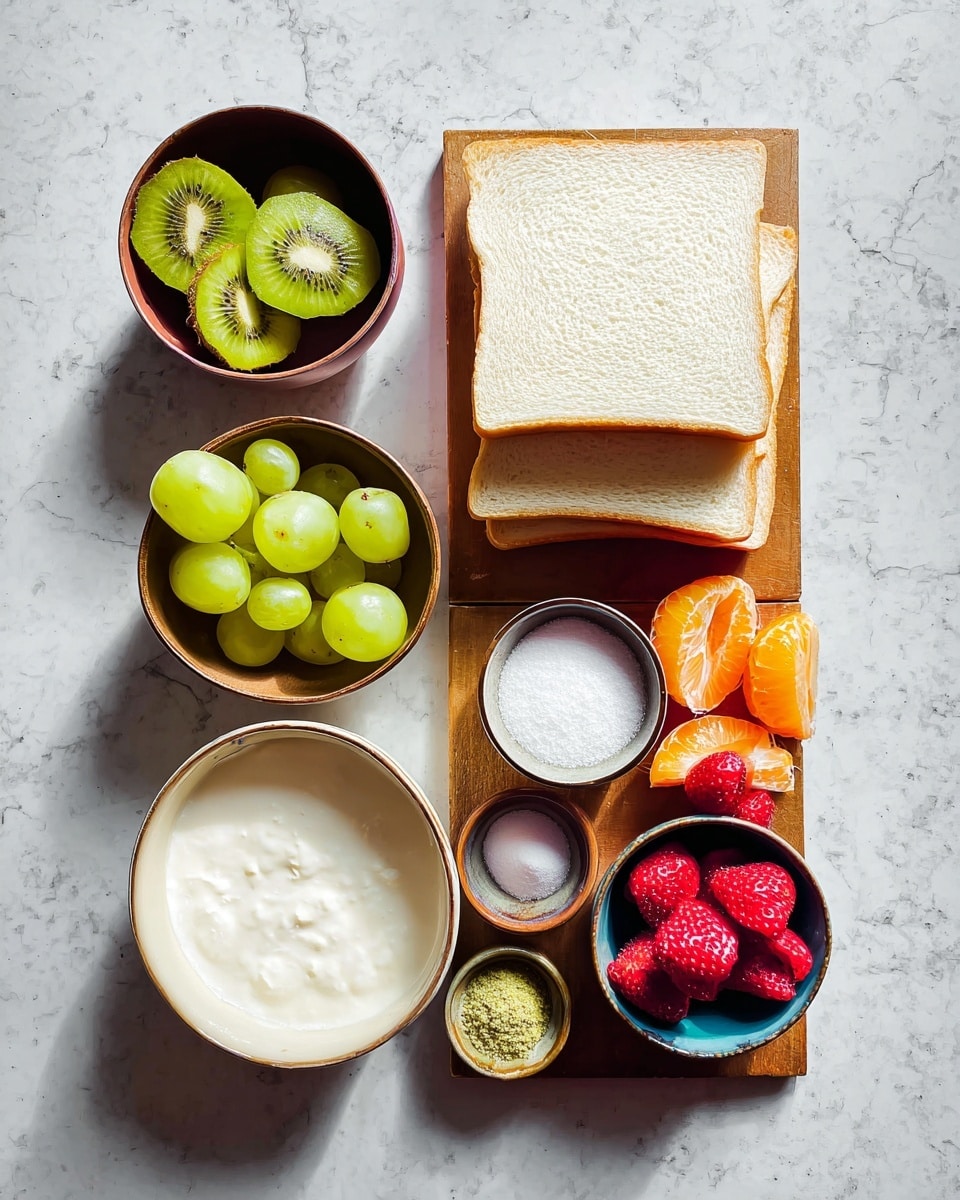 The image shows a top view of ingredients arranged neatly on a white marbled surface. On the right side, there are six slices of white bread stacked in two small piles. To the left of the bread, a wooden board holds three small bowls: the top bowl has three peeled green kiwis, the middle one contains a mix of green grapes and purple grapes, and the bottom bowl is filled with fresh red strawberries. Next to the wooden board, there is a peeled mandarin orange split into segments. Above these, a white bowl with side handles is filled with white liquid, likely milk or cream. To the left of the bowl, a small brown bowl contains white granulated sugar, and above it, a small white bowl has a greenish-brown powder, possibly matcha or a spice. Photo taken with an iphone --ar 4:5 --v 7