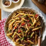 Creamy Italian Sausage Pasta with Tomatoes, Peppers, and Onions Recipe